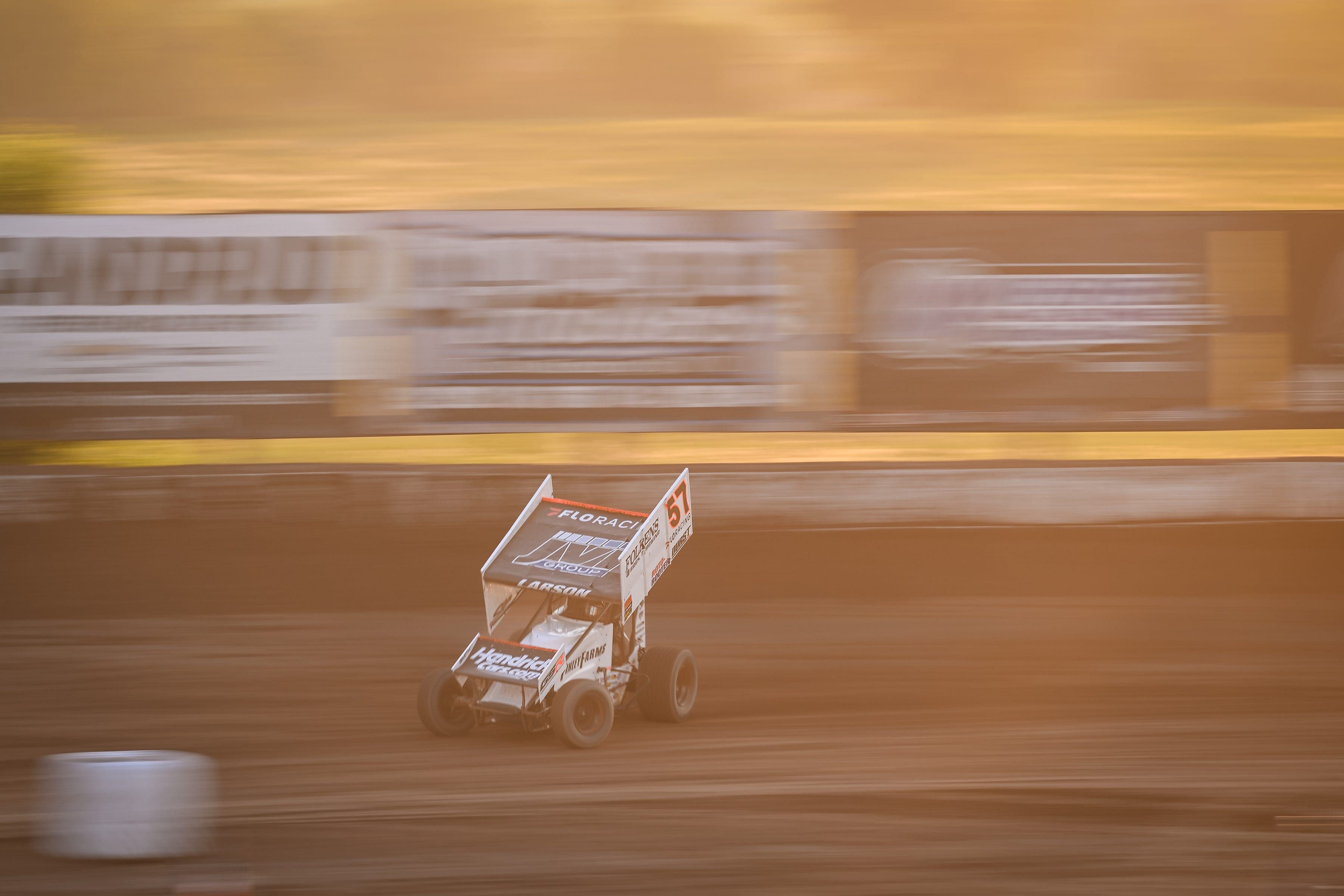 Kyle Larson (57) drives into Turn 3 in the Rayce Rudeen Foundation Race on Thursday. Source: Imagn